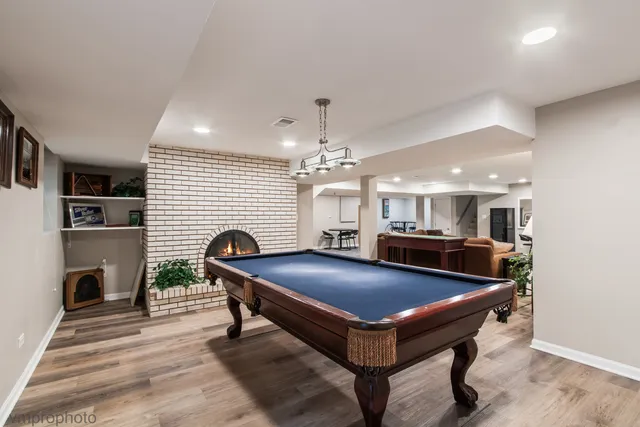 a view of a livingroom with furniture and an empty room