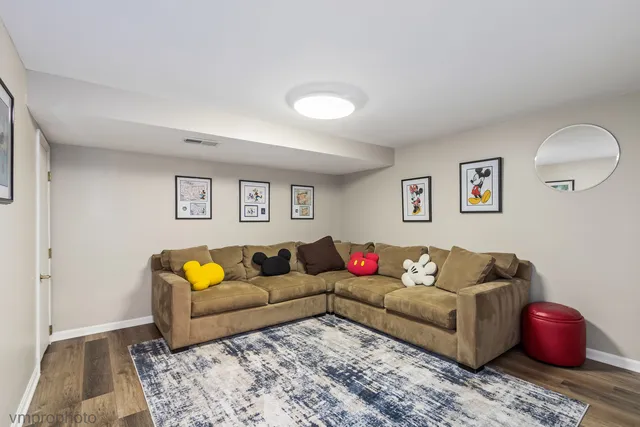 a view of balcony with wooden floor and outdoor seating