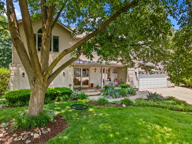 an aerial view of a city with lake view