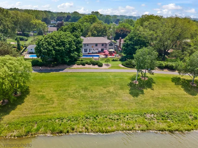 a view of swimming pool with a patio