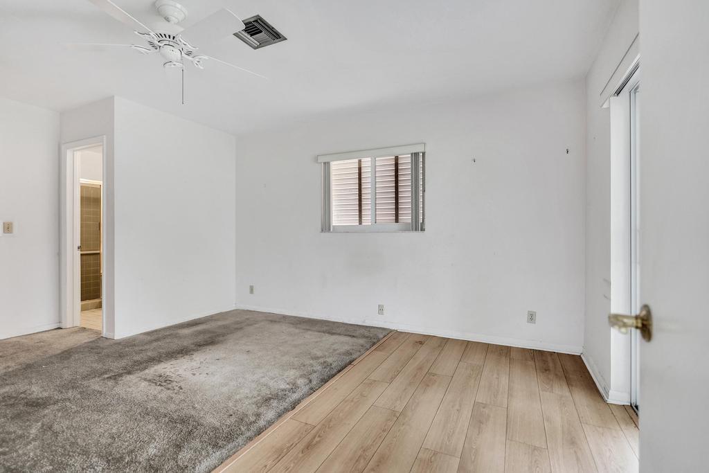1236 Northwest 15th Street Boca Raton, FL 33486 - Photo 18 of 58 wooden floor in an empty room