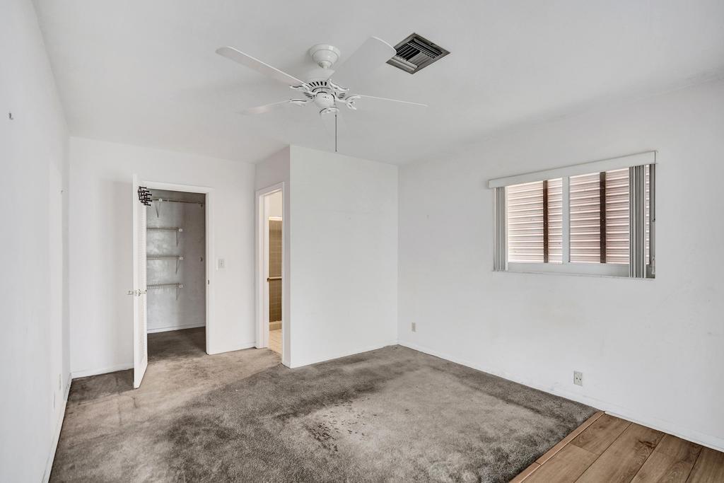 1236 Northwest 15th Street Boca Raton, FL 33486 - Photo 20 of 58 wooden floor in an empty room with a window