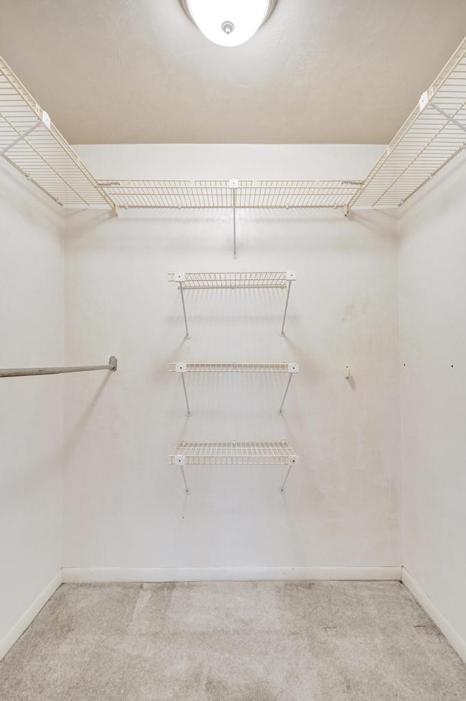 1236 Northwest 15th Street Boca Raton, FL 33486 - Photo 23 of 58 a view of a room with racks on the wall
