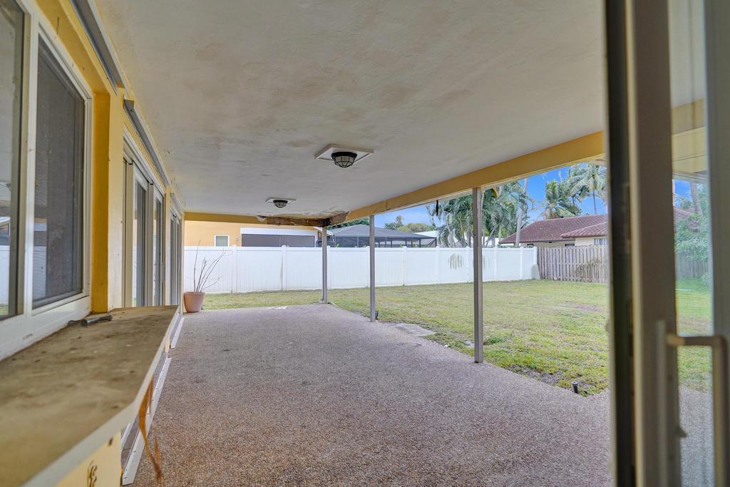 1236 Northwest 15th Street Boca Raton, FL 33486 - Photo 50 of 58 a view of a porch