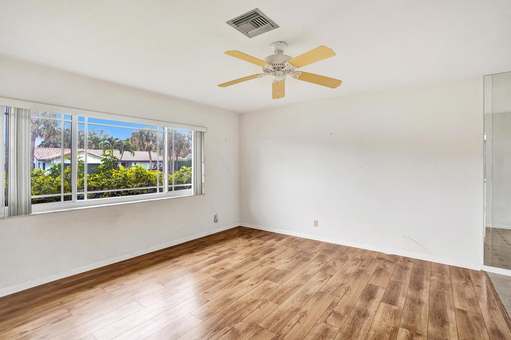 1236 Northwest 15th Street Boca Raton, FL 33486 - Photo 8 of 58 a view of an empty room with a window