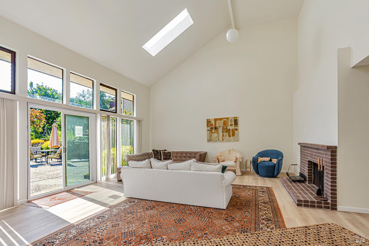 820 Mission Avenue, Unit 7 San Rafael, CA 94901 - Photo 24 of 33 a living room with furniture and a floor to ceiling window