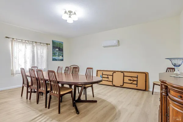 a view of a dining room with furniture