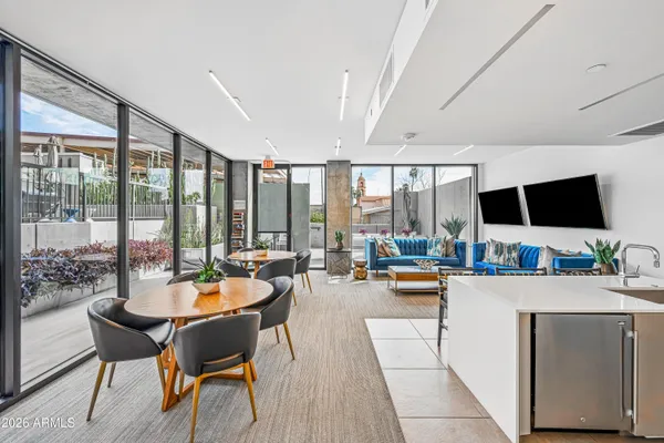 a view of a balcony with chairs