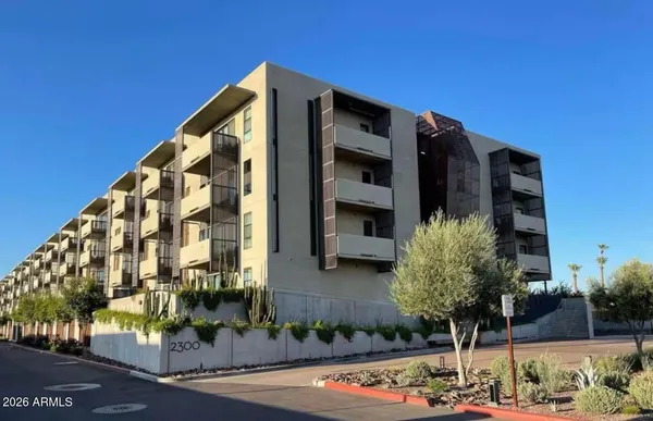 a view of residential houses with city view