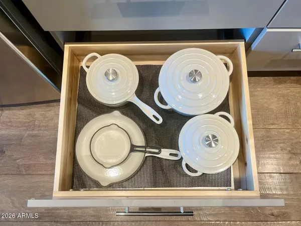 a bathroom with a toilet and a mirror