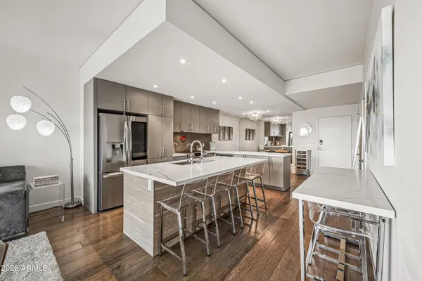 a view of tall buildings with a street sign
