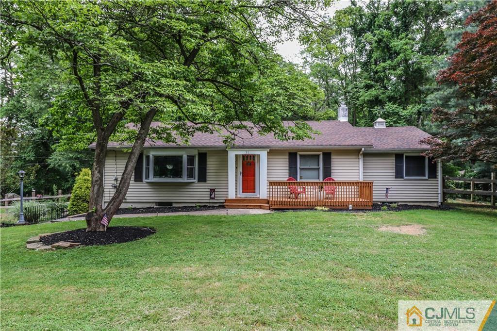 31 Silvers Road Freehold, NJ 07728 - Photo 2 of 46 a front view of a house with a garden
