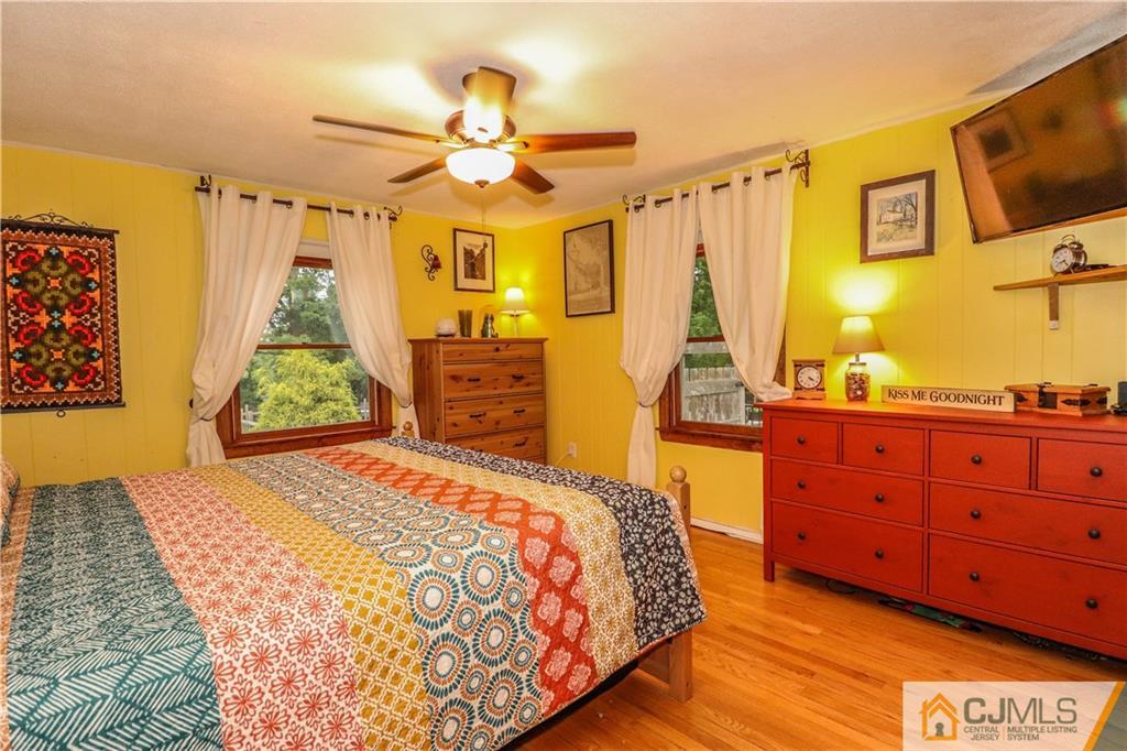 31 Silvers Road Freehold, NJ 07728 - Photo 24 of 46 a bedroom with a bed dresser and a window