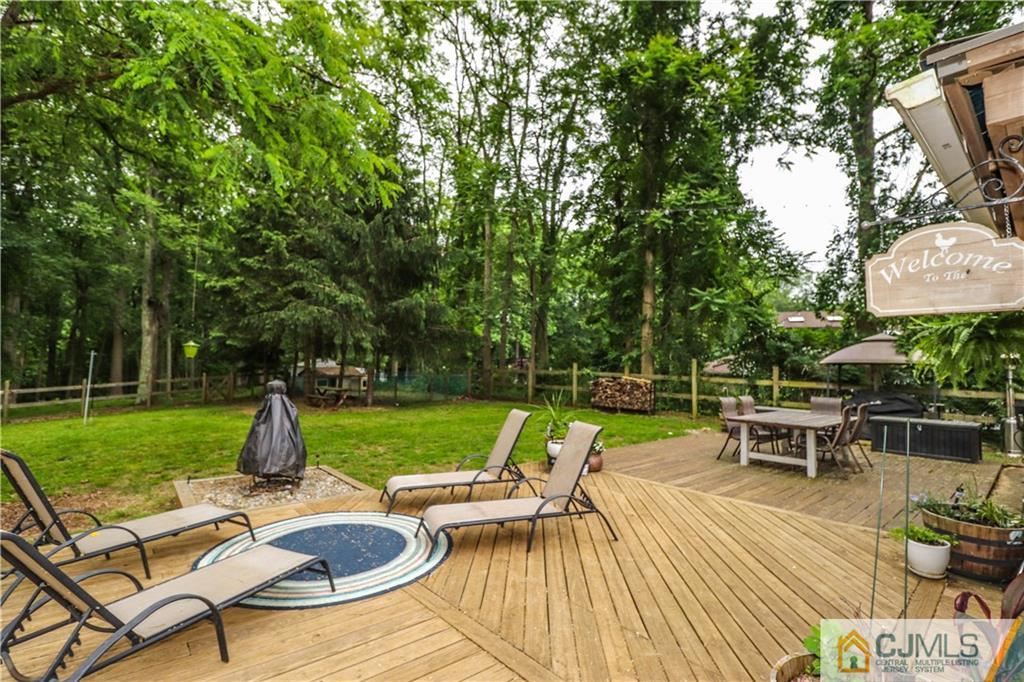 31 Silvers Road Freehold, NJ 07728 - Photo 35 of 46 a view of a backyard with sitting area