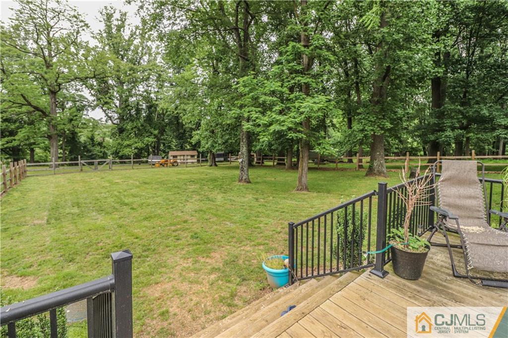 31 Silvers Road Freehold, NJ 07728 - Photo 37 of 46 a view of a lake with a patio
