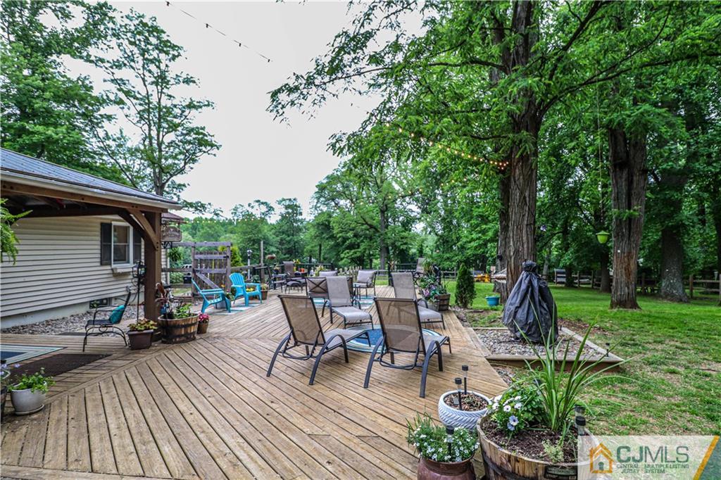 31 Silvers Road Freehold, NJ 07728 - Photo 39 of 46 a view of backyard with sitting area and garden
