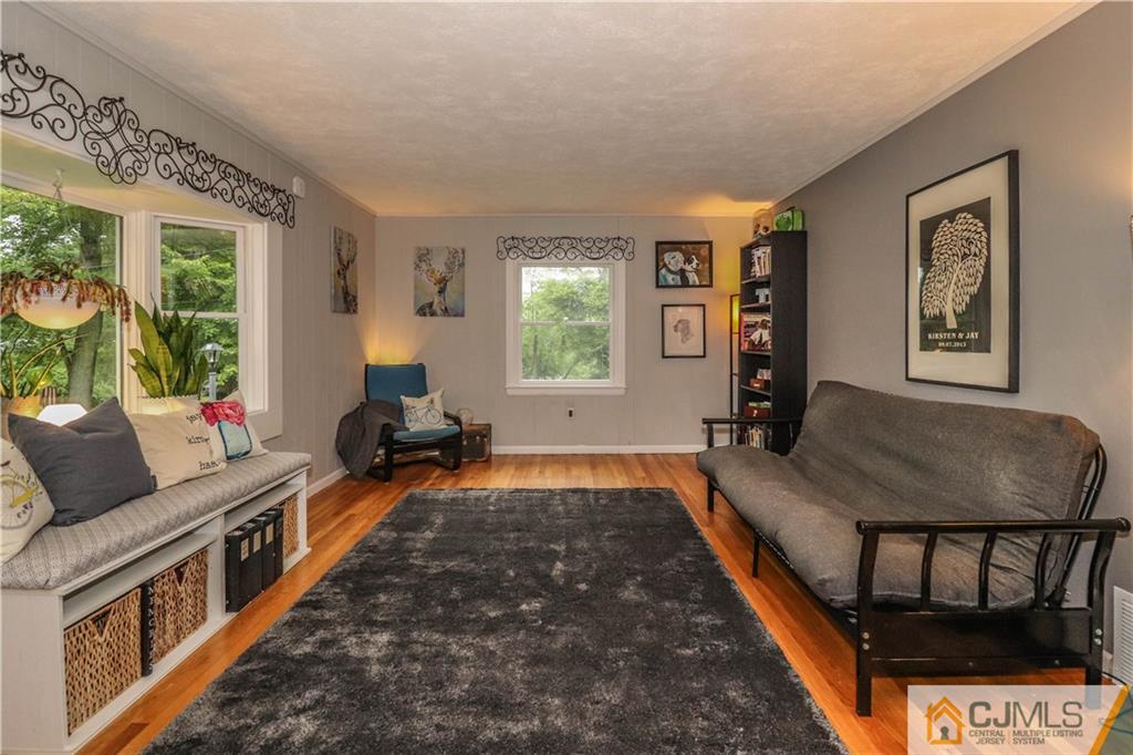 31 Silvers Road Freehold, NJ 07728 - Photo 10 of 46 a living room with furniture and a window