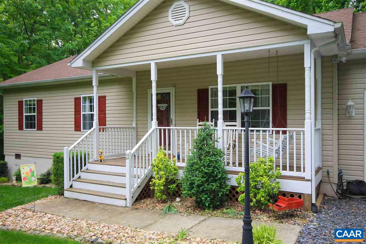 11 Zephyr Road Palmyra, VA 22963 - Photo 3 of 21 a view of a house with a small window and flower plants