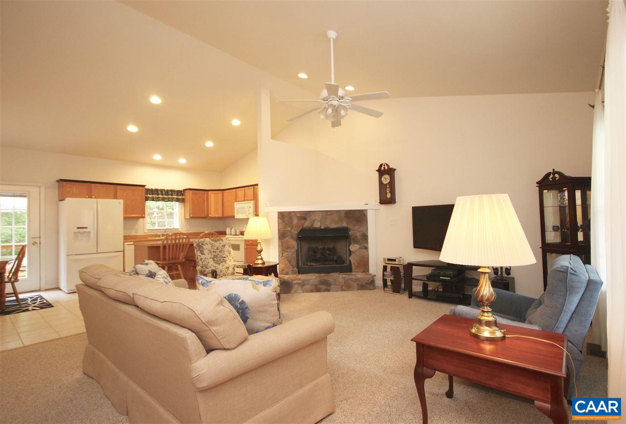 11 Zephyr Road Palmyra, VA 22963 - Photo 5 of 21 a living room with furniture and a fireplace