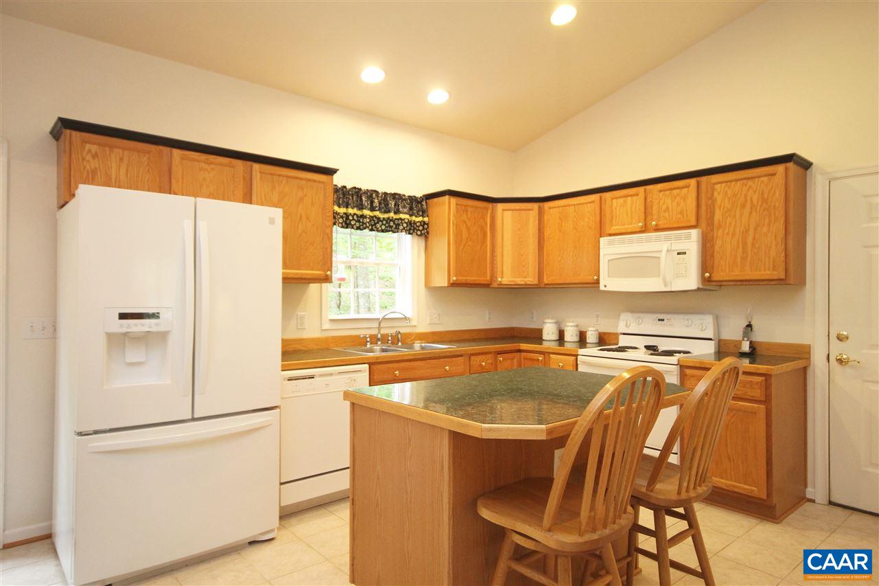 11 Zephyr Road Palmyra, VA 22963 - Photo 8 of 21 a kitchen with stainless steel appliances a refrigerator sink and cabinets
