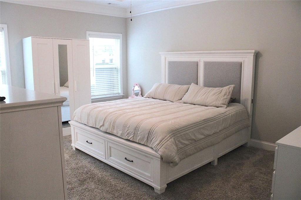 728 Harmony Road Temple, GA 30179 - Photo 14 of 29 a bedroom with a bed and window