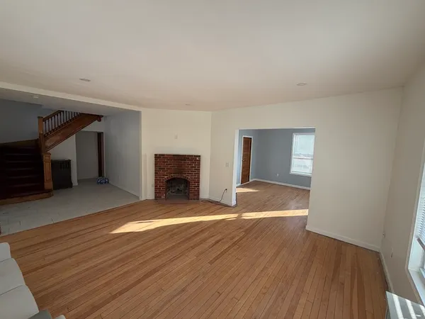 a view of a living room and bathroom
