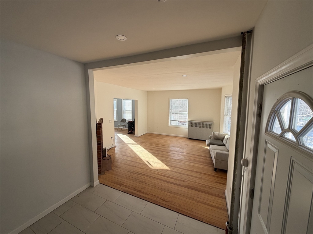 12 Stoneland Road Worcester, MA 01603 - Photo 15 of 36 a view of a living room and bathroom