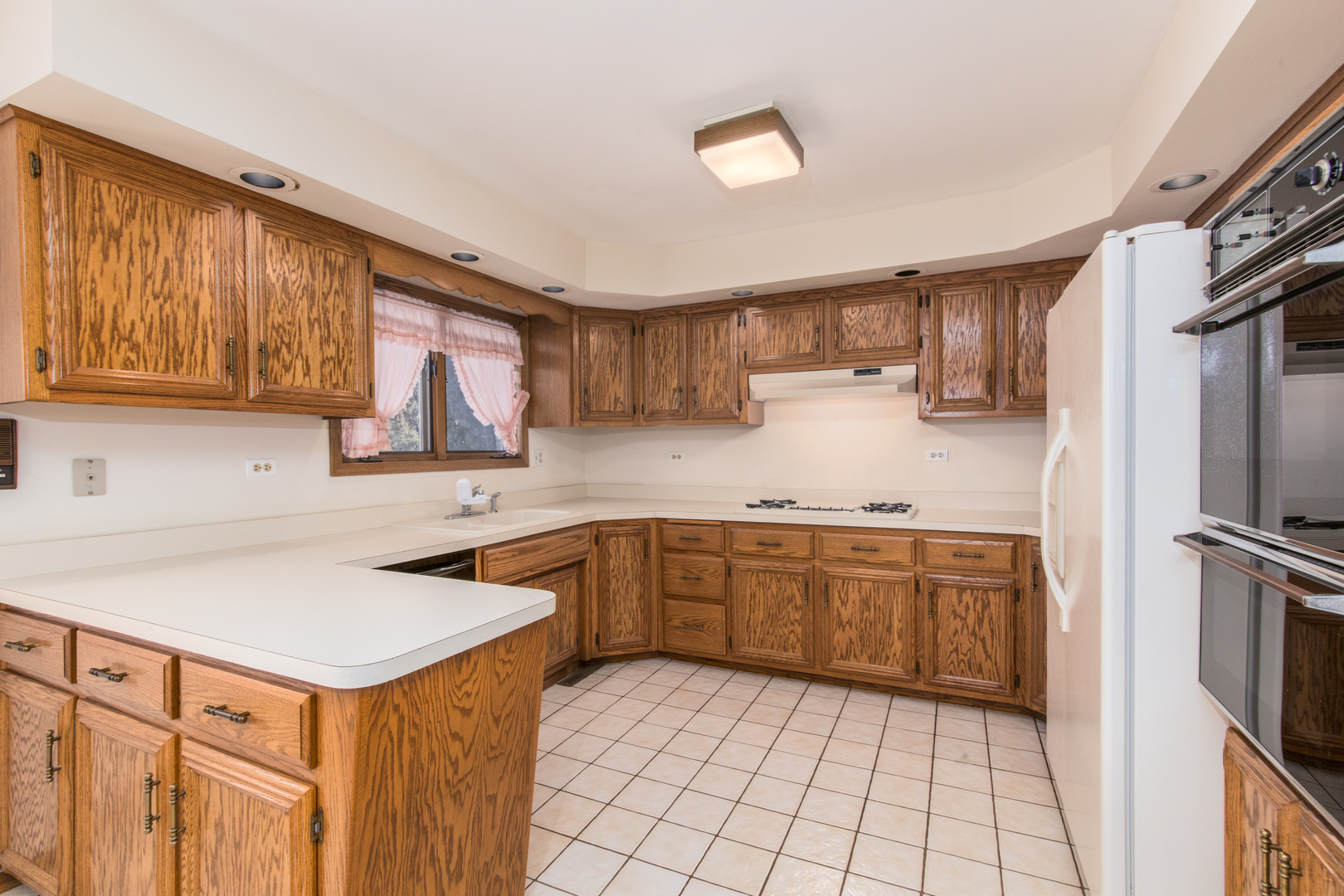 1414 West Talcott Road Park Ridge, IL 60068 - Photo 2 of 41 a kitchen with stainless steel appliances granite countertop a sink stove and refrigerator