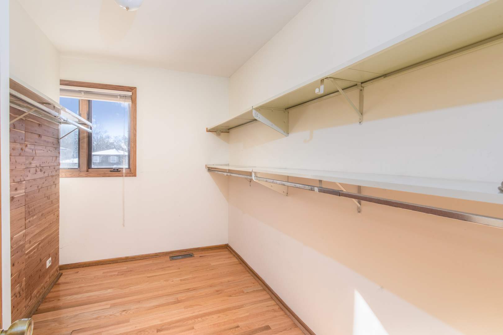 1414 West Talcott Road Park Ridge, IL 60068 - Photo 26 of 41 a view of a room with racks on the wall