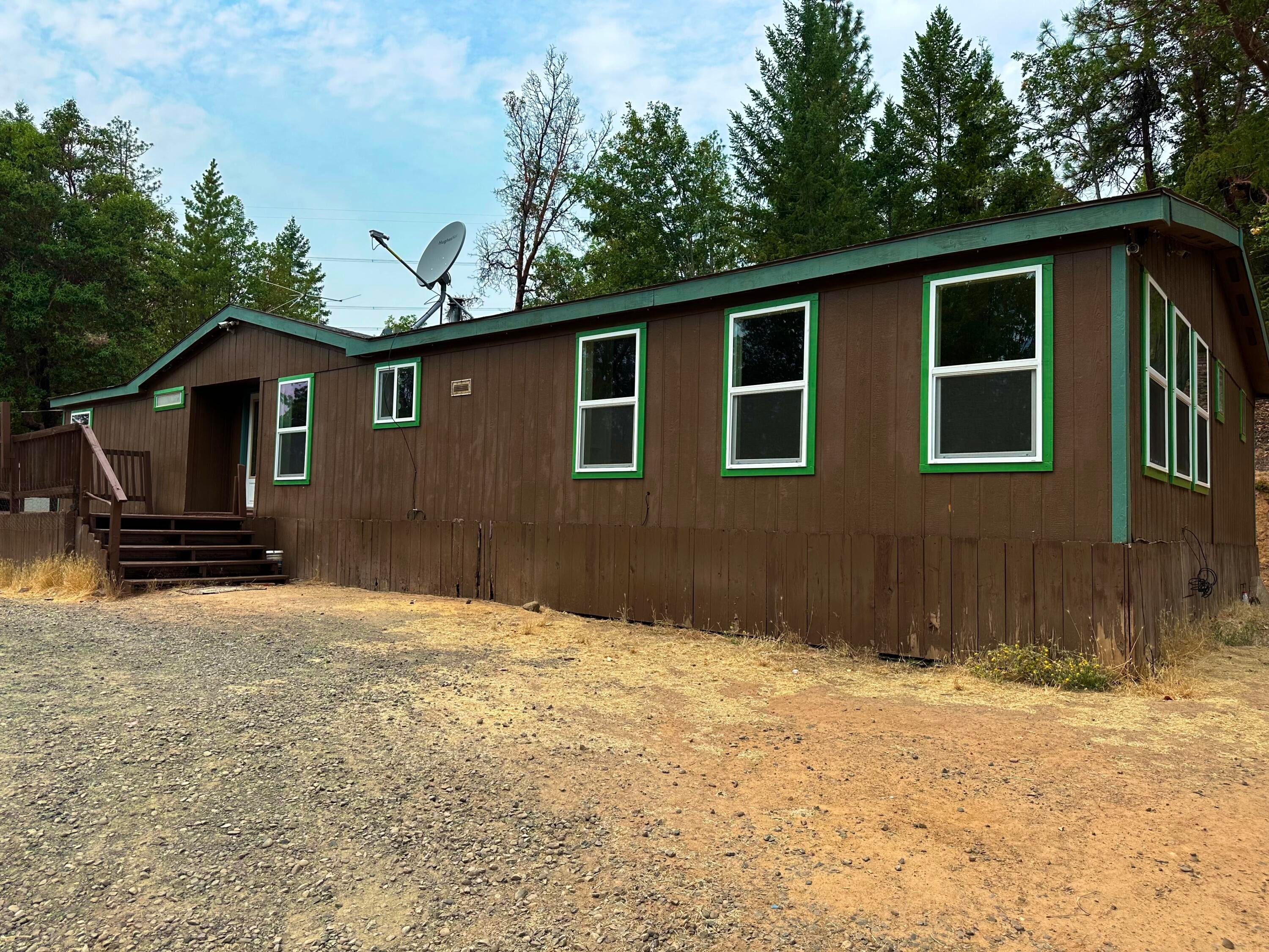 Large 1674 Sq ft Manufactured Home. 3/2 bath. Bonus room, dining room, new windows, counter tops,cabinets carpet, paint, appliances, shower surround.