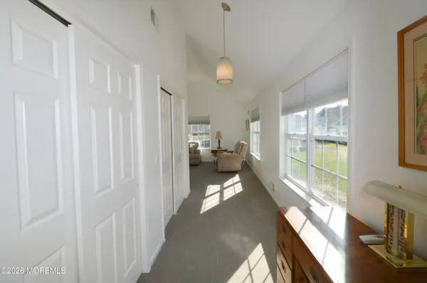 a view of entryway with livingroom