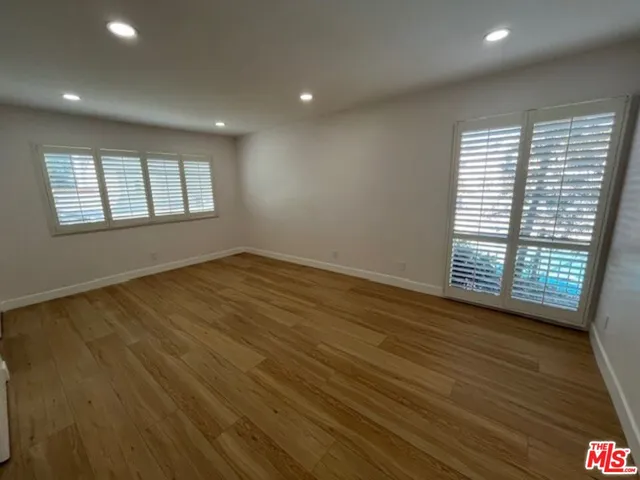 a bathroom with a double vanity sink and mirror
