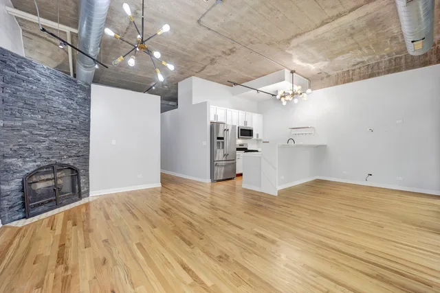 a view of a livingroom with a kitchen