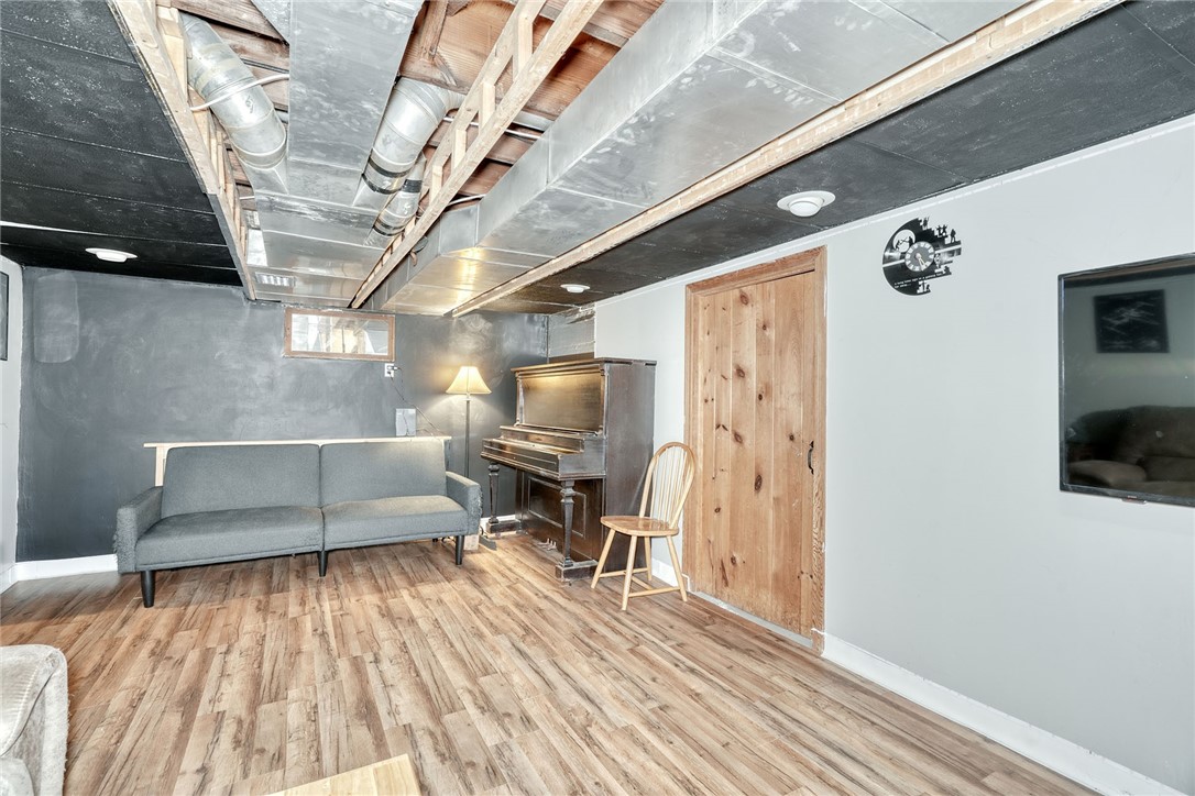 606 Bay Road Webster, NY 14580 - Photo 34 of 49 Finished basement rec room