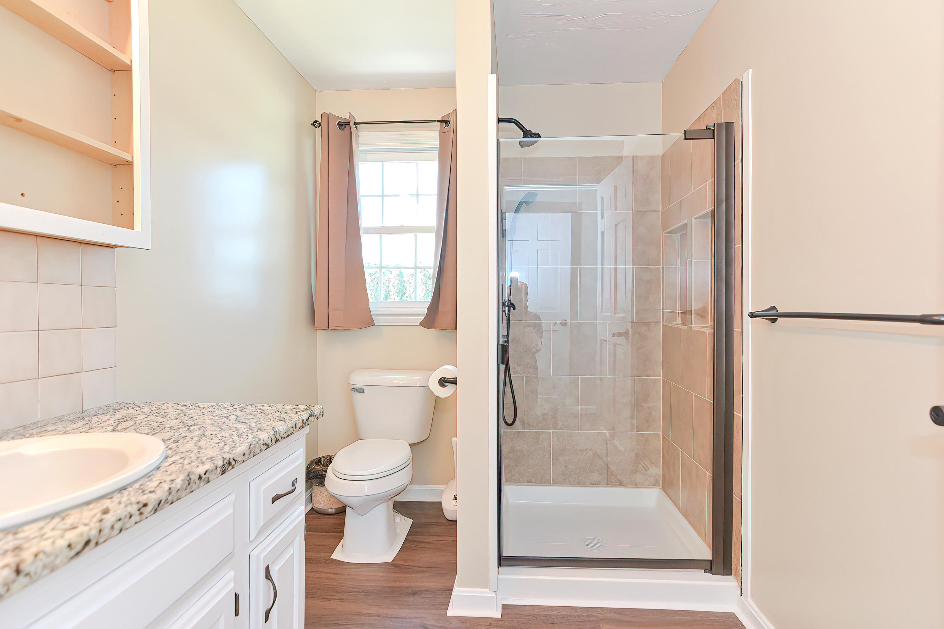 7 Wellfield Road Forestdale, MA 02644 - Photo 28 of 42 a bathroom with a granite countertop sink a toilet and shower