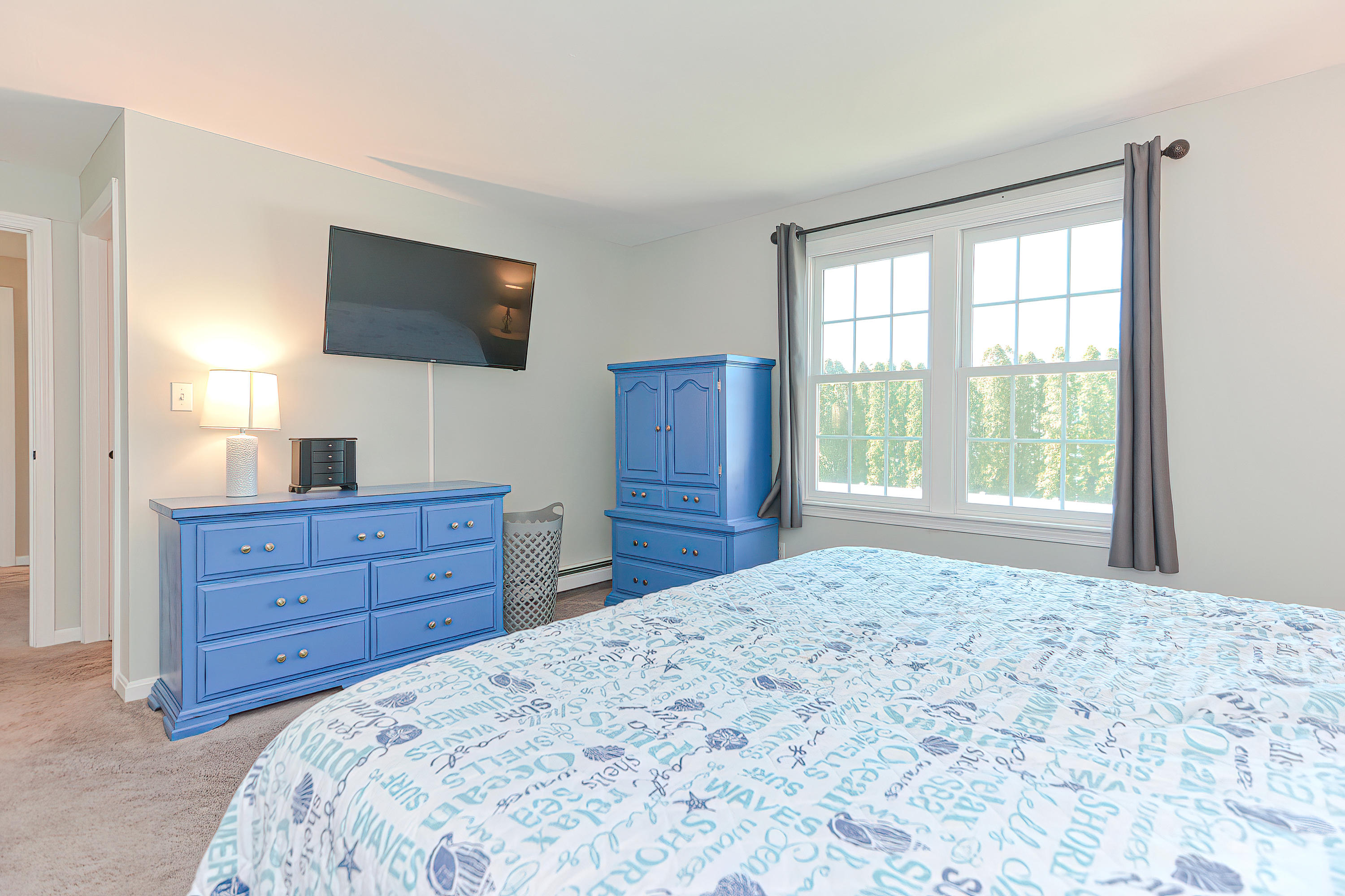 7 Wellfield Road Forestdale, MA 02644 - Photo 30 of 42 a bedroom with a bed and a flat screen tv