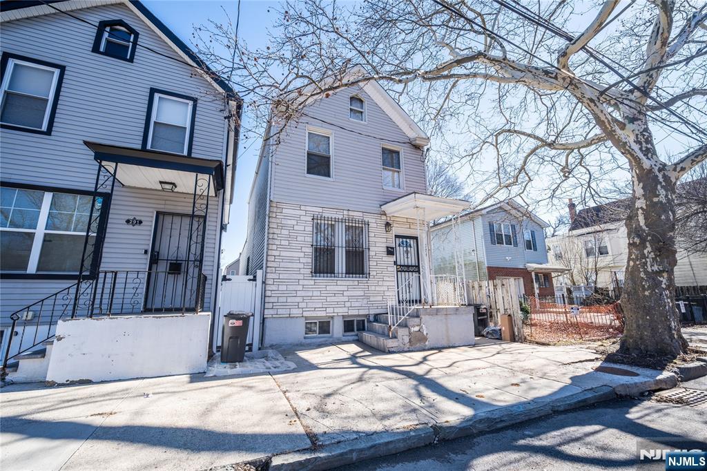 289 Rose Street Newark, NJ 07108 - Photo 2 of 29 a view of a house with a patio