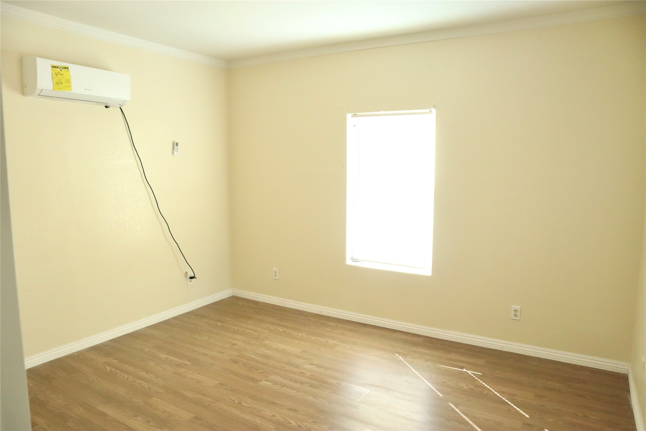 2689 County Road 32 Angleton, TX 77515 - Photo 13 of 15 a view of an empty room with wooden floor