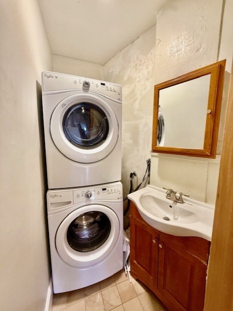 164 Prince Street, Unit 4 Boston, MA 02113 - Photo 13 of 16 a utility room with sink dryer and washer