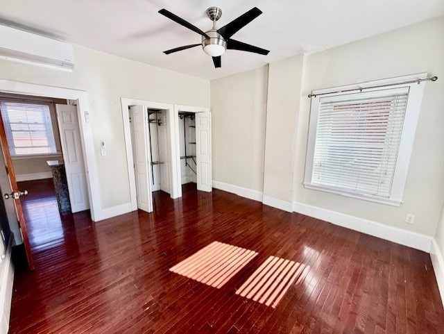 164 Prince Street, Unit 4 Boston, MA 02113 - Photo 9 of 16 a view of an empty room with wooden floor and a window