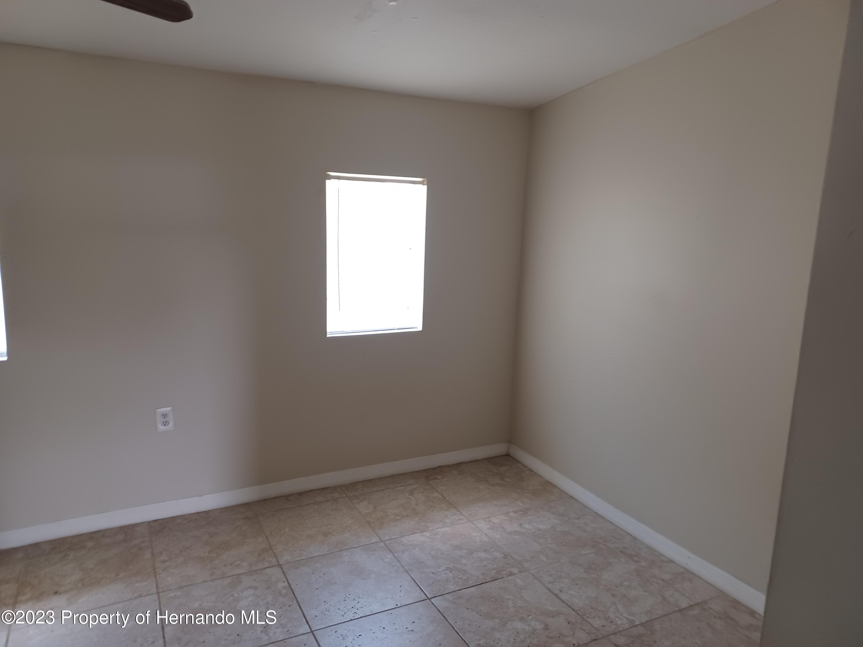 595 Swallow Lane Spring Hill, FL 34606 - Photo 7 of 24 20230721_124548