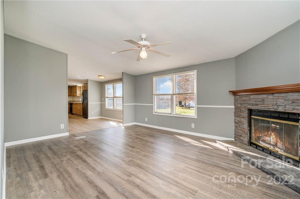 4289 Henry Dellinger Road Maiden, NC 28650 - Photo 14 of 42 a view of an empty room with window and fire place