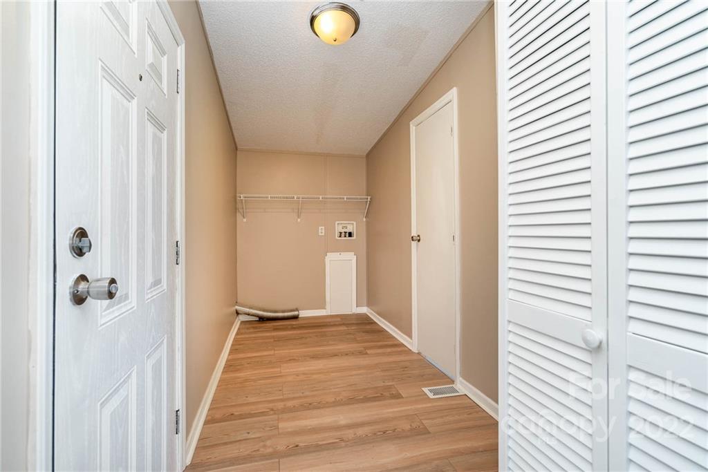 4289 Henry Dellinger Road Maiden, NC 28650 - Photo 15 of 42 a view of a livingroom from a hallway