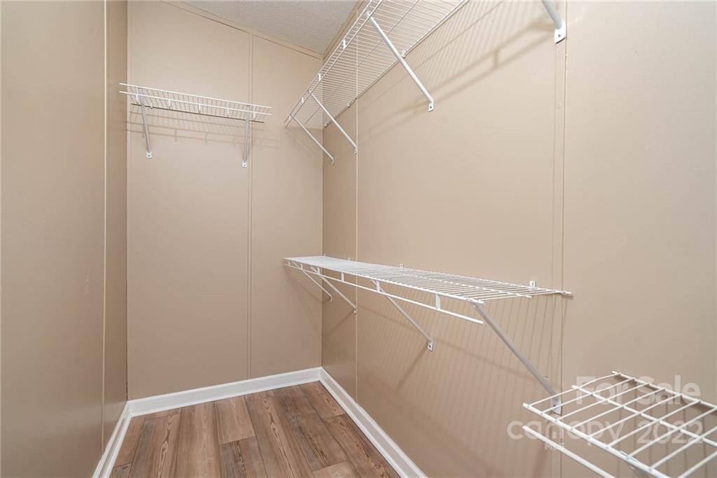 4289 Henry Dellinger Road Maiden, NC 28650 - Photo 18 of 42 a view of a room with racks on the wall