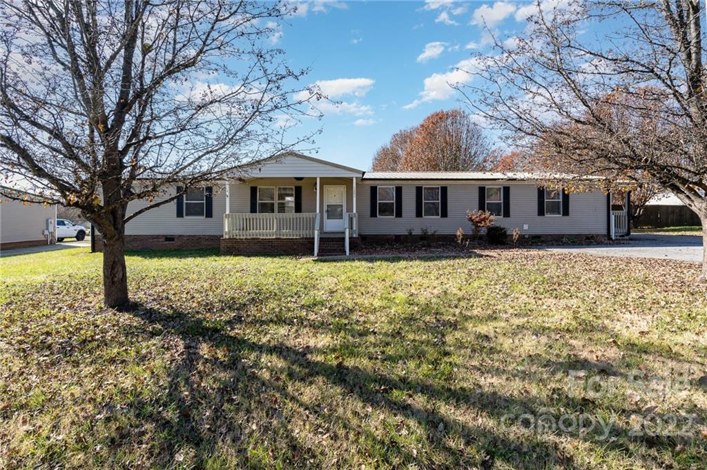 4289 Henry Dellinger Road Maiden, NC 28650 - Photo 39 of 42 front view of a house with a yard