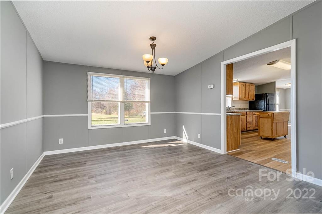 4289 Henry Dellinger Road Maiden, NC 28650 - Photo 6 of 42 a view of an empty room with a window
