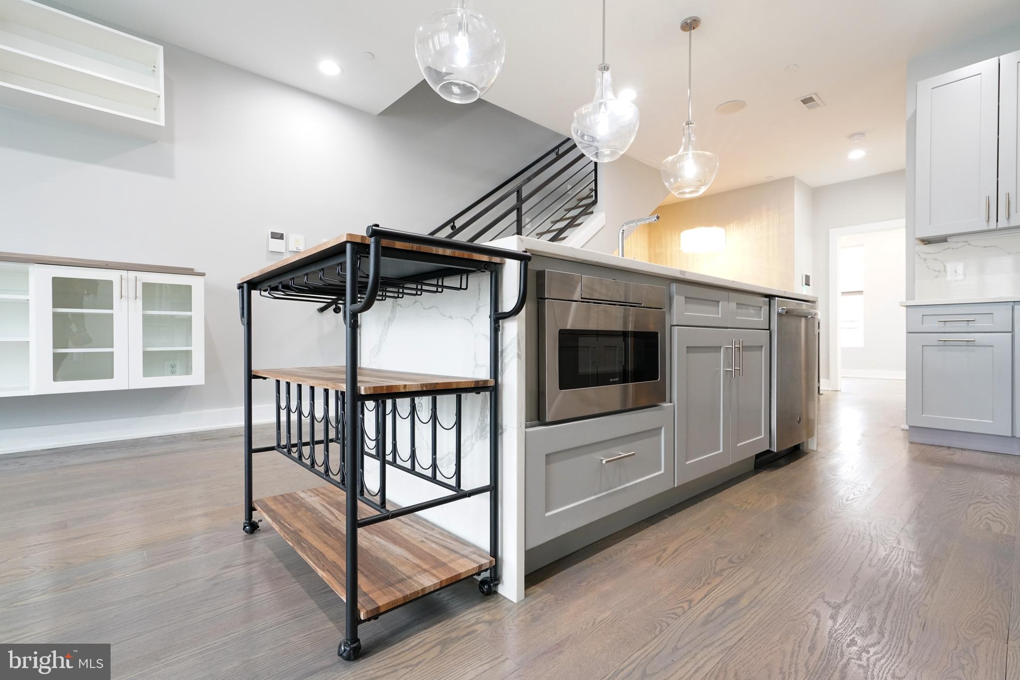 1632 K Street Northeast, Unit PH Washington, DC 20002 - Photo 15 of 69 a view of a hallway with entryway wooden floor and front door