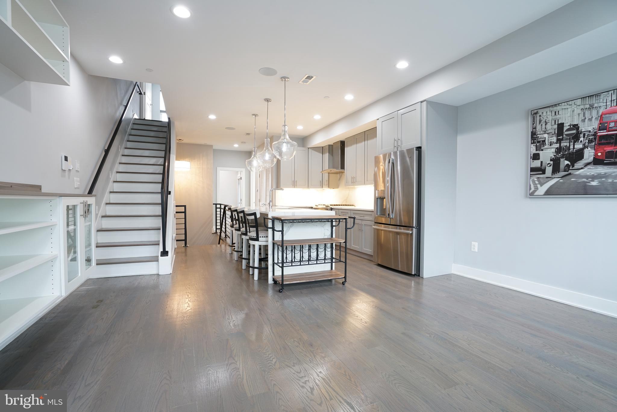 1632 K Street Northeast, Unit PH Washington, DC 20002 - Photo 21 of 69 a kitchen with stainless steel appliances refrigerator and stove