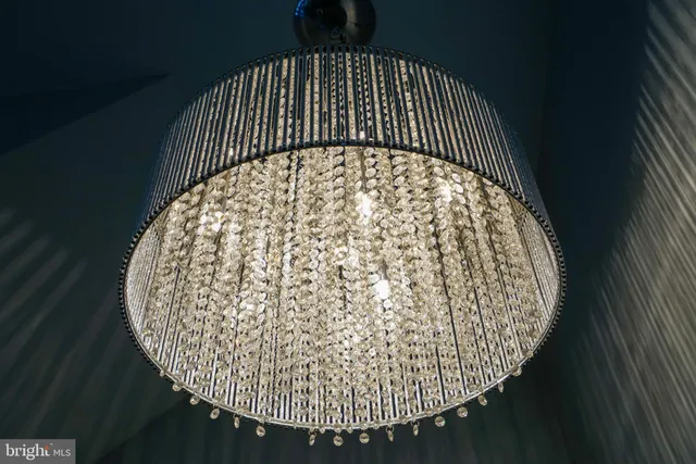 a bathroom with a sink and mirror with toilet