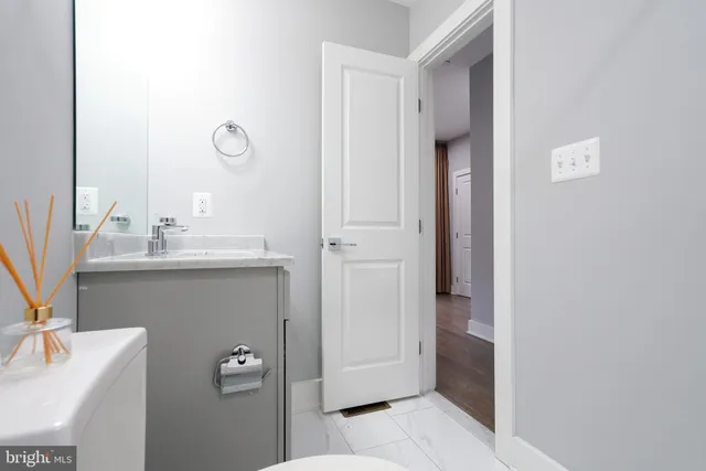 a bathroom with a sink and a shower